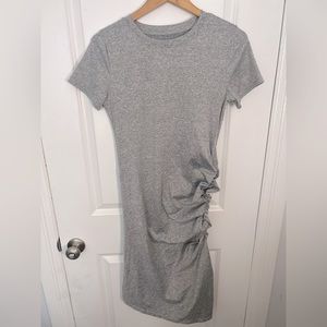 Brand new, M body-con dress, ruching on side, hits above the knee.
